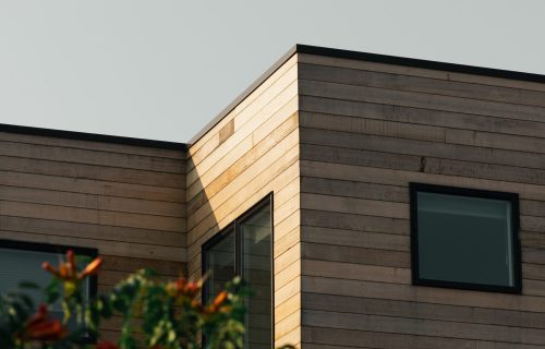 Engineered wood siding can replace traditional wood, though it takes more maintenance than vinyl or fiber cement