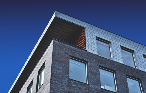 Installing synthetic stone siding is a cheaper alternative to natural rock